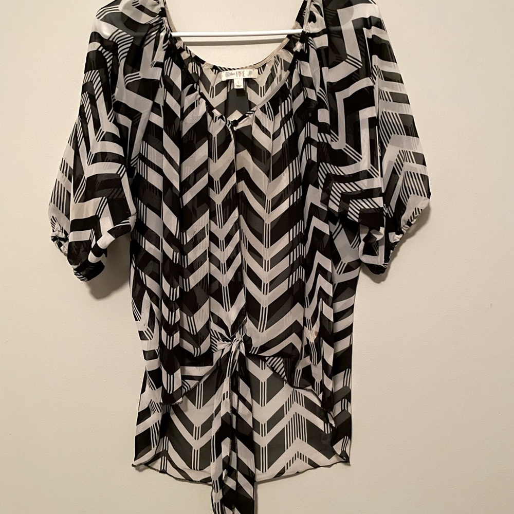 Love Fire blouse size large. Excellent condition